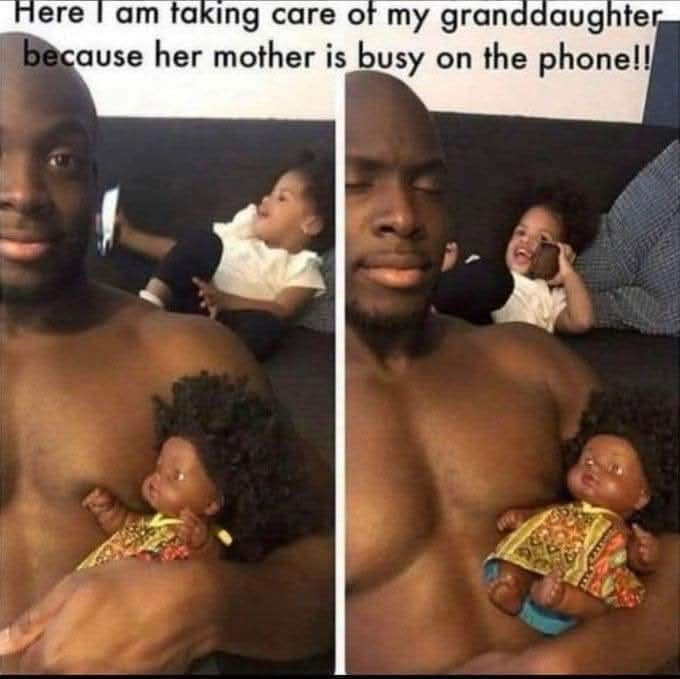 Here I am taking care of my granddaughter, because her mother is busy on the phone!!