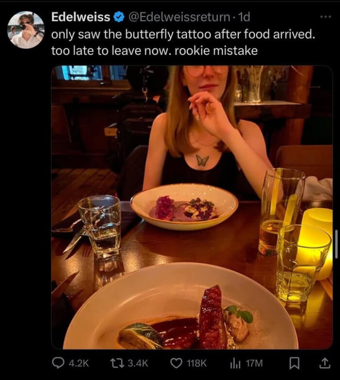 only saw the butterfly tattoo after food arrived. too late to leave now. rookie mistake