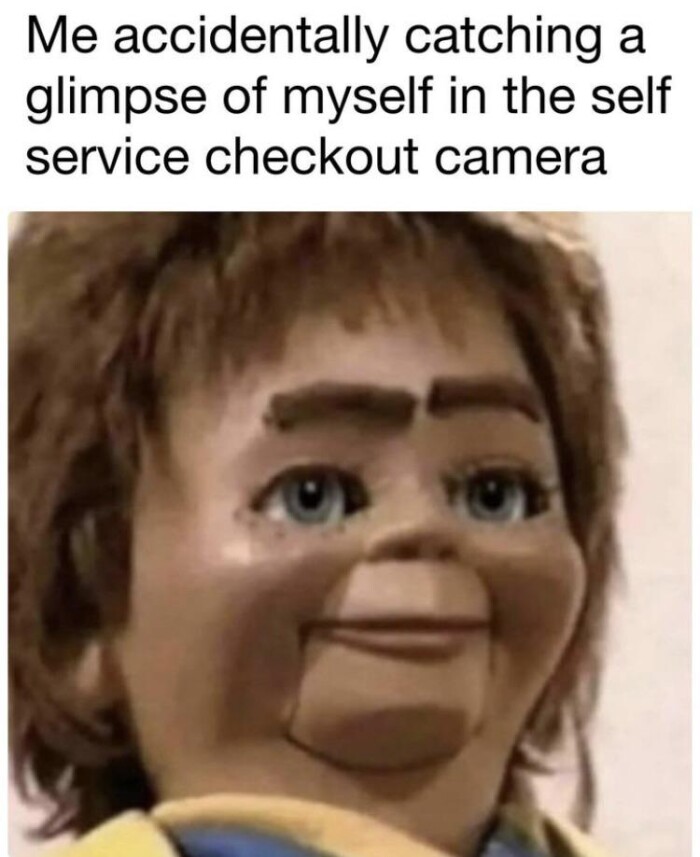 Me accidentally catching a glimpse of myself in the self service checkout camera